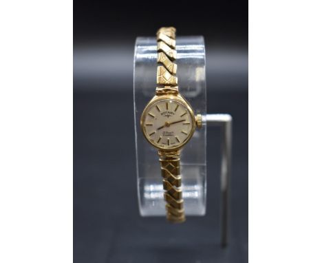 A cased 9ct gold Rotary manual wind ladies wristwatch,&nbsp;18mm, on replacement gold plated expanding bracelet. 