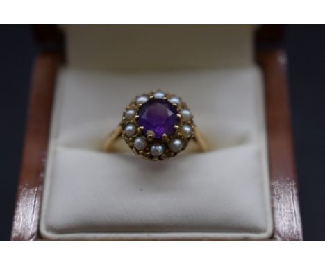 A 9ct gold amethyst and pearl cluster ring, size L 1/2; together with a 9ct gold amethyst and diamond cluster ring, size N, g