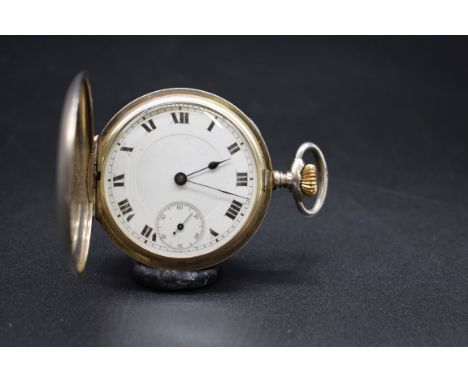An engine turned silver half hunter pocket watch,&nbsp;50mm, stem wind, import mark London 1919. 