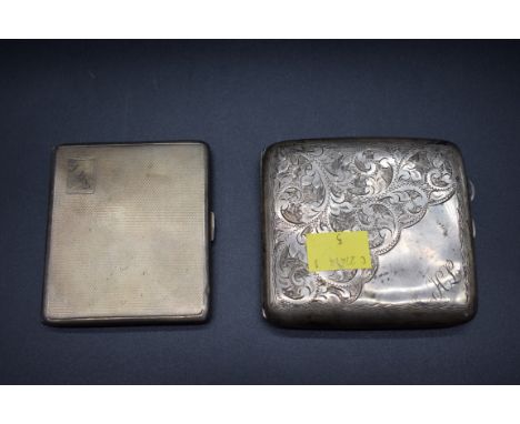 An engine turned silver cigarette case; and one other, 177g. (2) 