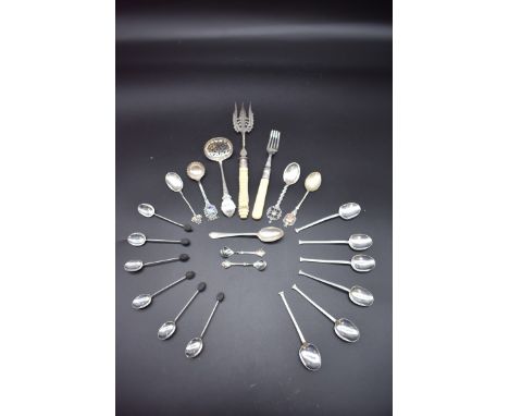 A Victorian silver sifter ladle, by&nbsp;George Unite, Birmingham 1870; together with two sets of six silver teaspoons; and v