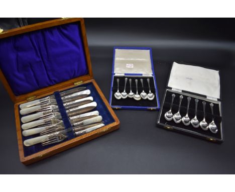 A cased set of six bright cut silver coffee spoons, by S Ltd, Birmingham 1928; together with a cased set of six silver teaspo