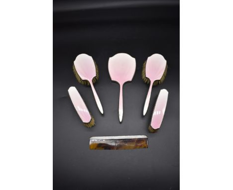 A silver and pink guilloche enamel five piece brush set, by W.G.S Ltd, Birmingham 1955; together with a matching silver mount