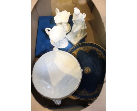 A box containing a selection of Royal Worcester branded porcelain 