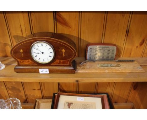 An inlaid wooden cased Mantel clock, together with a golfing trophy and a desktop measure equivalents ready reckoner 