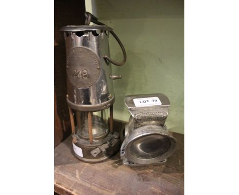 An antique miner's lamp, together with a vintage silver 'King of the road' Lucas bicycle lamp 
