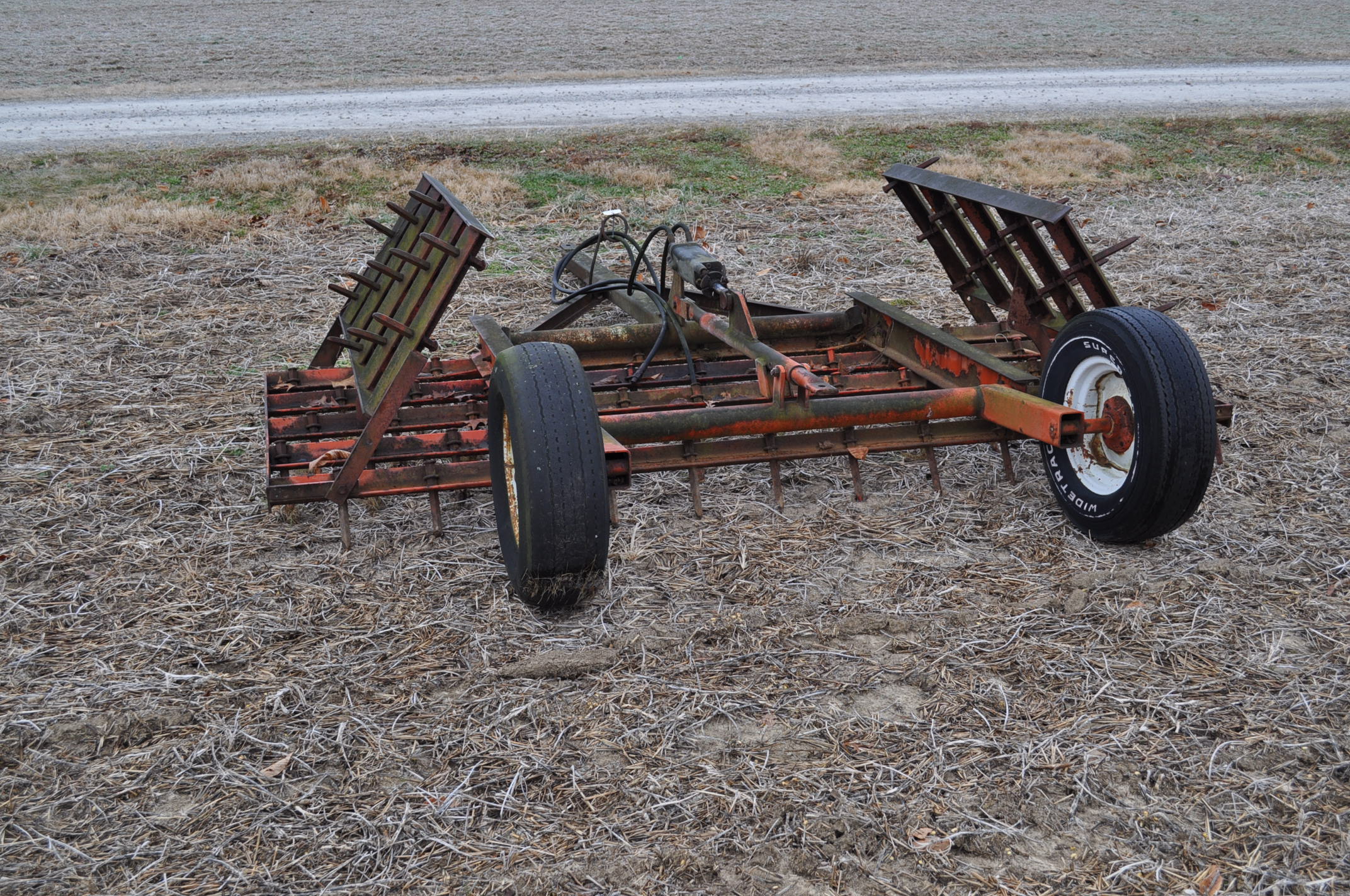 14' 5 bar spike tooth harrow, hyd lift, manual fold, pull type, rear hitch,