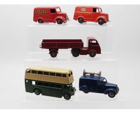 A group of DINKY Toys comprising a 31b Dunlop Trojan van, a 31a Esso Trojan van, a 290 Double Decker bus, a 34c Loudspeaker v