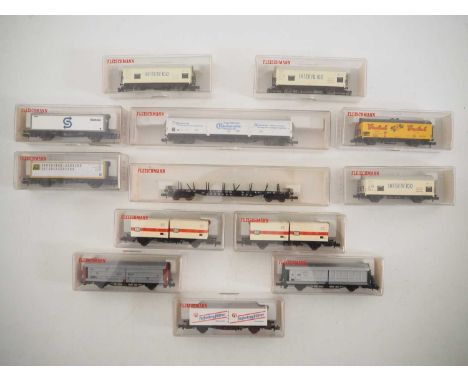 A group of boxed FLEISCHMANN N gauge container wagons and flat open wagon - VG in G boxes (13)