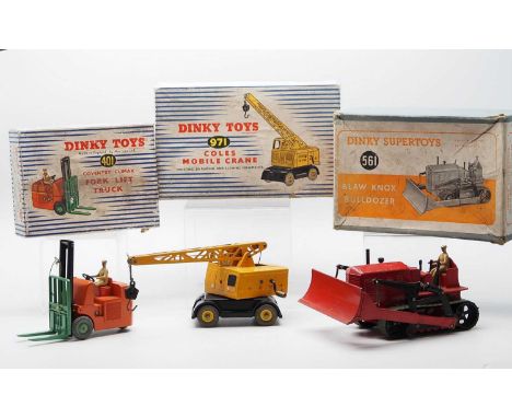 A group of DINKY Toys,  comprising a  561 Blaw Knox Bulldozer, a 401 Coventry Climax Fork Lift Truck and a 971 Coles Mobile C