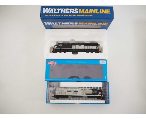 A pair of HO gauge American outline diesel locomotives by WALTHERS MAINLINE and ROUNDHOUSE both in Norfolk Southern liveries 