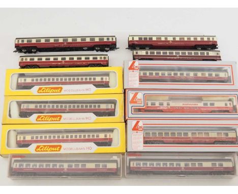A group of HO gauge German outline TEE passenger coaches in red/cream by FLEISCHMANN, LILIPUT, LIMA and others - G/VG in F/G 