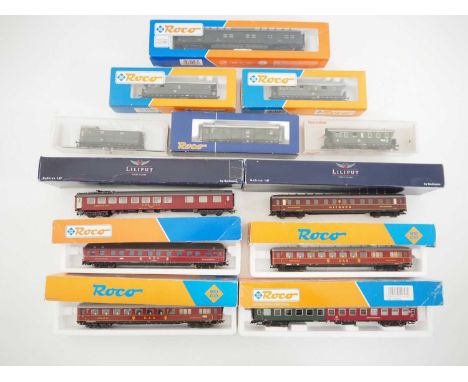 A group of HO gauge European outline mixed passenger coaches by FLEISCHMANN, ROCO and LILIPUT - VG in G/VG boxes (12)