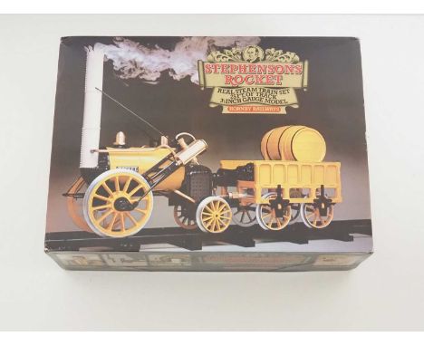 A HORNBY 3.5" scale live steam Stephenson's Rocket train pack - appears complete - VG in G/VG box (with original shipping out