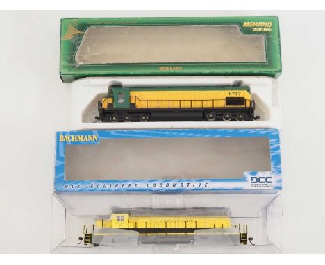 A pair of HO gauge American outline diesel locomotives by MEHANO/BACHMANN in Chicago &amp; North Western and Susquehanna live