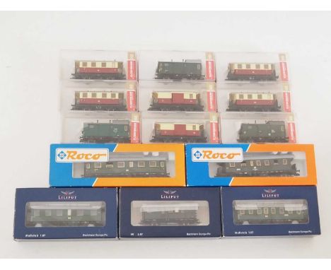 A group of HO gauge European outline four and six wheel passenger coaches by FLEISCHMANN, ROCO and LILIPUT - VG in G/VG boxes