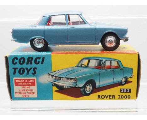 A CORGI No 252 Rover 2000, steel blue with silver trim and chrome spun hubs - VG/E in G,VG box