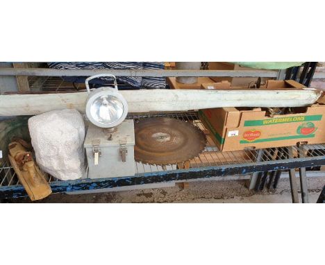 Shelf of items to include oak yolk, lights, saw blade etc