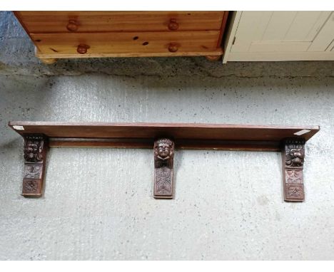 Carved oak mantel shelf