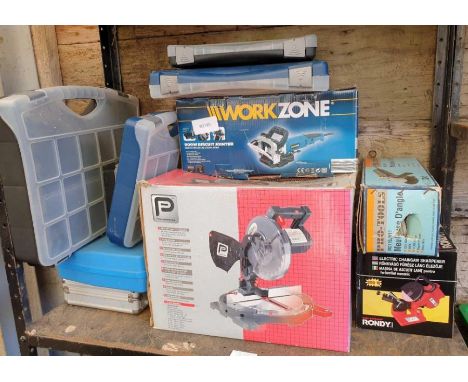 Collection of tools to include a biscuit jointer, mitre saw, chainsaw sharpener etc