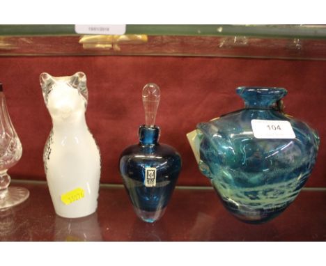 A Mdina glass vase; a Mdina glass scent bottle; and a Wedgwood paperweight in the form of a cat 