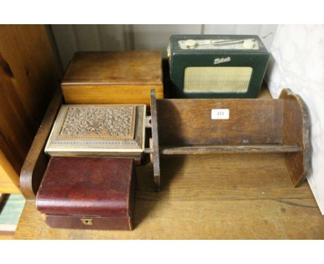 A Roberts radio; a small oak book trough; a Victorian red leather jewellery box; and two wooden trinket boxes 