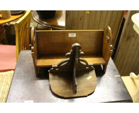An oak book trough; and an Edwardian fret carved wall bracket 