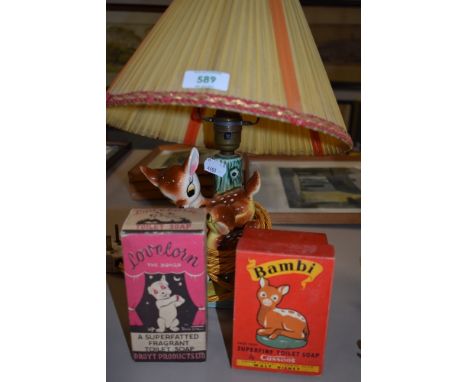A Kitsch Bambi deer model table lamp and two vintage packaged soaps