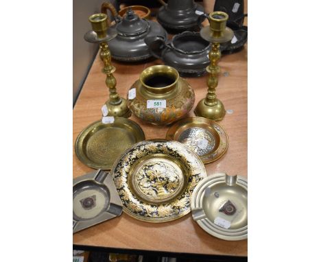 A selection of brass and similar wares including Automobile Rally dishes and heavy set candle sticks