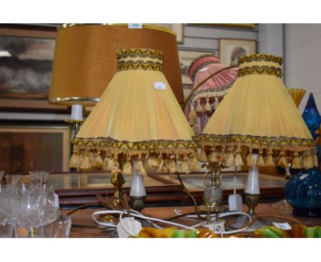 A selection of vintage ormolu effect lamps including pair and large candle stick style