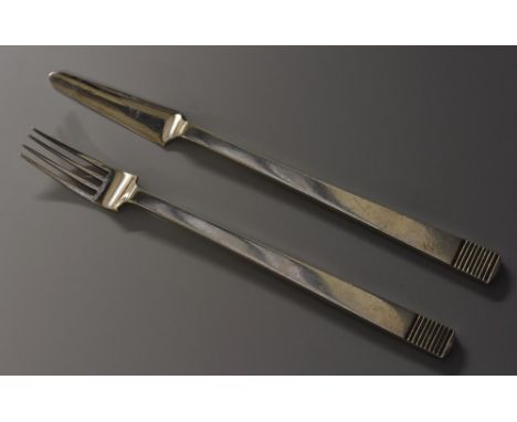 An Art Deco silver knife and fork, geometric terminals, the former 17cm long, Charles Boyton, London 1937