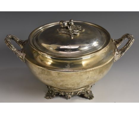 A George IV silver tureen, domed cover with acorn finial, acanthus grasped handles, shell feet, 27cm wide, Richard Pearce & G
