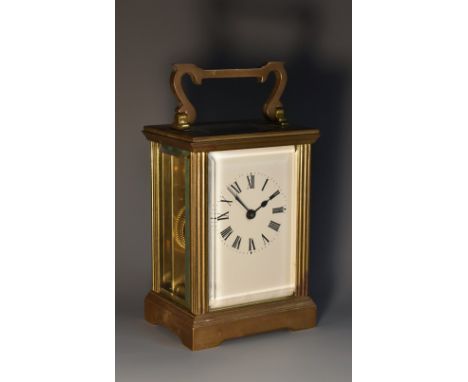 A French lacquered brass carriage timepiece, 6cm rectangular enamel dial inscribed with Roman numerals, key-wound movement wi