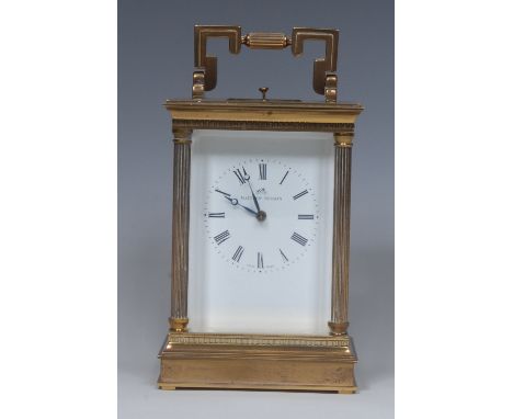 A 20th century repeater carriage clock, white dial with Roman numerals, inscribed Matthew Norman, reeded columns to angles, a