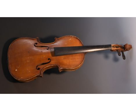 An early 20th century English violin, the one-piece back 36cm long excluding button, paper label inscribed in ink Frederick W