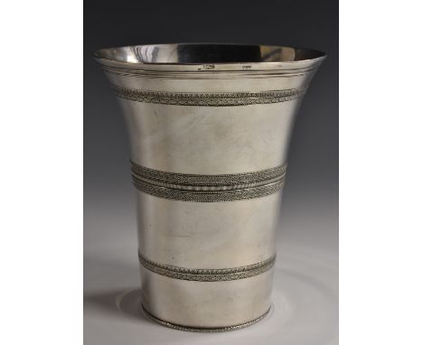 A Portuguese silver flared cylindrical beaker, engine turned with geometric bands, 14.5cm high, 12.5oz