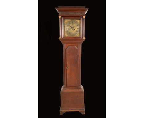 A George III oak longcase clock, 31cm square brass dial inscribed John Stancliffe, Roman and Arabic numeral, mask and leafy s