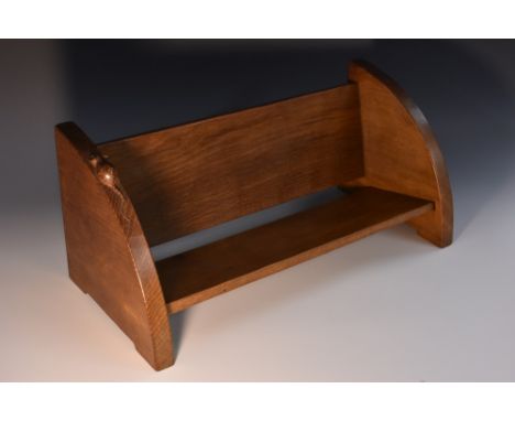 Robert Thompson, Mouseman of Kilburn - an oak table top book rack, adzed overall, 46cm wide, carved mouse signature