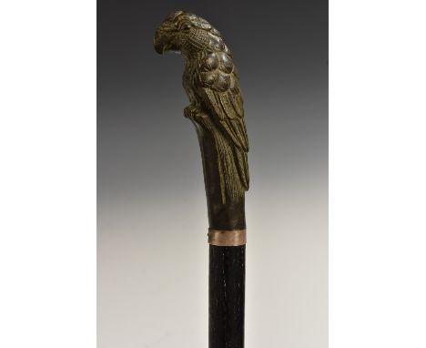 A 19th century novelty animalier type walking stick, patinated pommel cast as a parrot, silver collar, ebonised shaft, 103cm 