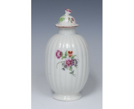 A Worcester ribbed ovoid  tea canister and cover,  painted with scattered flowers, domed cover, flower finial, 16.5cm high,  