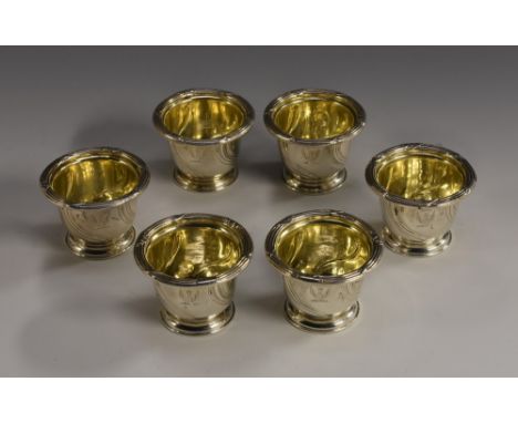Paul Storr - a set of six William IV silver bucket shaped salts, wrapped reeded borders, gilt interiors, 4cm high, London 183