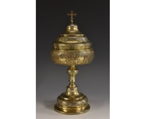 An 18th century Continental silver-gilt ciborium, possibly Italian, domed cover with cross finial, chased and engraved with f