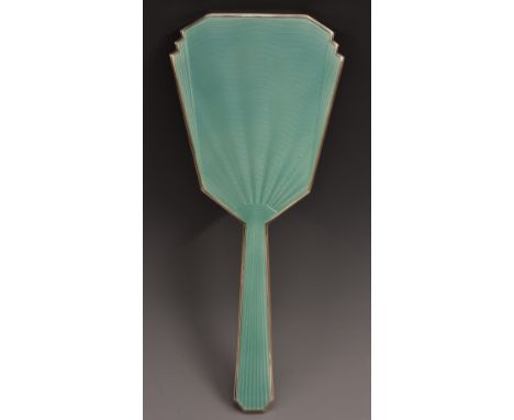An Art Deco silver and mint enamel hand mirror, of geometric outline, engine turned ground, 24.5cm long, Henry Clifford Davis