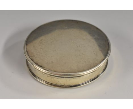 A George III silver coloured metal circular patch box, quite plain, push-fitting cover, 4.5cm diam, c.1800