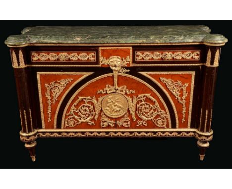 A Louis XV style gilt metal mounted commode a vantaux, verte antico marble top above a pair of frieze drawers and cupboard do