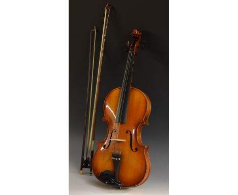 A Romanian viola, 39.6cm long two-piece back excluding button, interior label inscribed Michael Poller, Producator, De Viora,