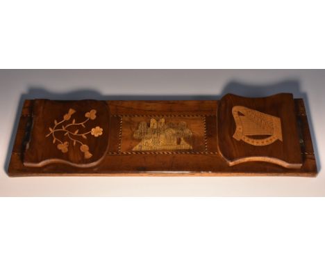 An Irish Killarney marquetry book slide, inlaid with a view of Muckross Abbey, a harp and the flowers of the union, 37.5cm wi
