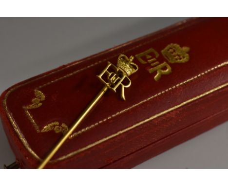 Cartier - a 1953 Queen Elizabeth II 18ct gold coronation stick pin, unmarked, tests as 18ct gold, 65mm long, 1.4g, conforming