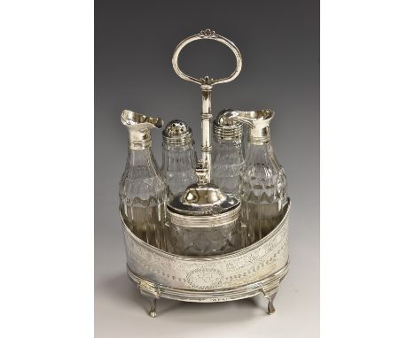 A George III silver navette-shaped five-piece cruet, comprising a pair of silver-mounted cut glass ewers, salt and pepper pot