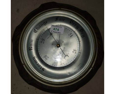 An oak cased aneroid barometer; 2 wooden boxes; 2 walking sticks; a parasol; etc. 